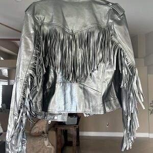 Black faux leather jacket with fringe